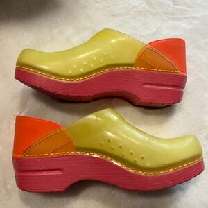 Dansko translucent pink, yellow and orange clogs